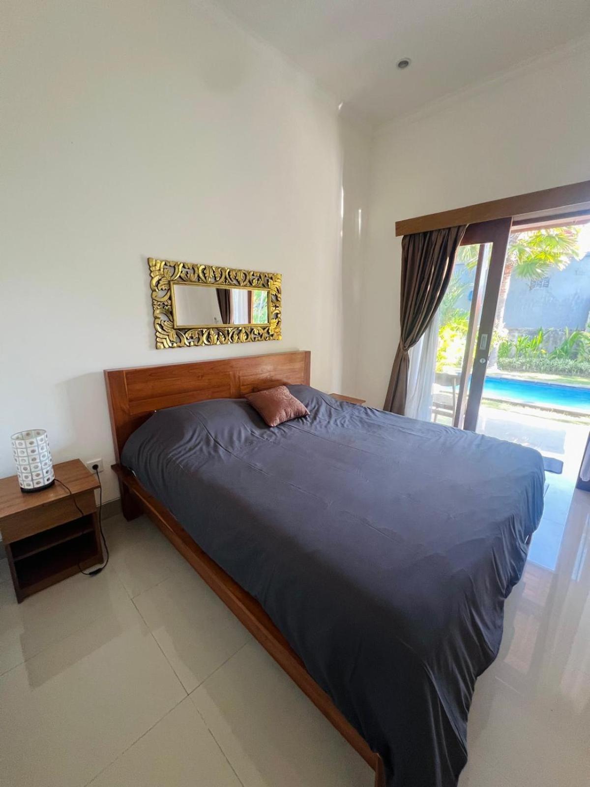 Wiryaroja Guest House Canggu Екстериор снимка